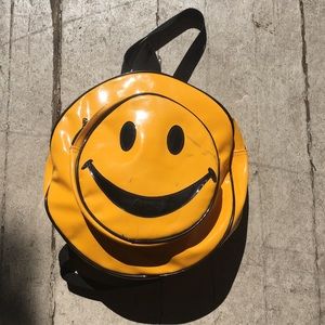 Vintage (90s) yellow smiley face vinyl backpack